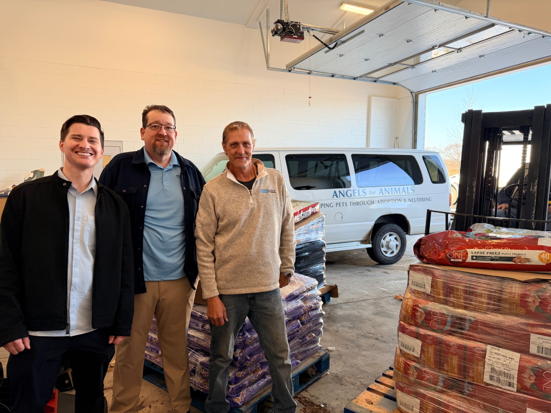 Ferguson's House of Furniture donates pet food to Angels for Animals